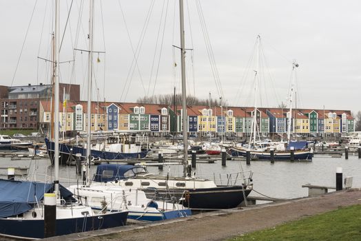 The dutch place Hellevoetsluis with boats in the harbour