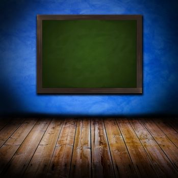 Grunge old wall with wooden planks floor and a blackboard