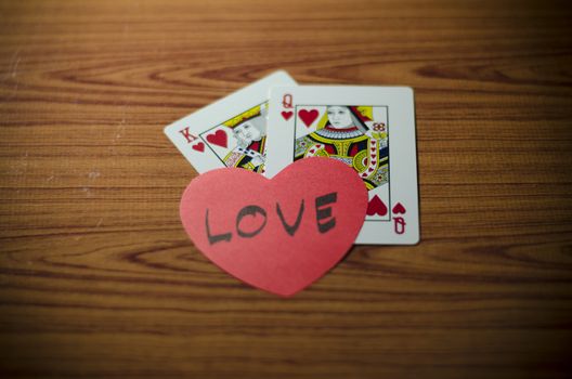 heart and love king queen  card on wood background