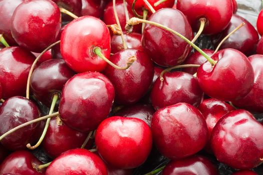 Beautiful red fresh cherry macro photo background