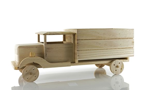 wooden handmade transporter car isolated on white