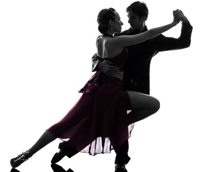 one caucasian couple man woman ballroom dancers tangoing in silhouette studio isolated on white background