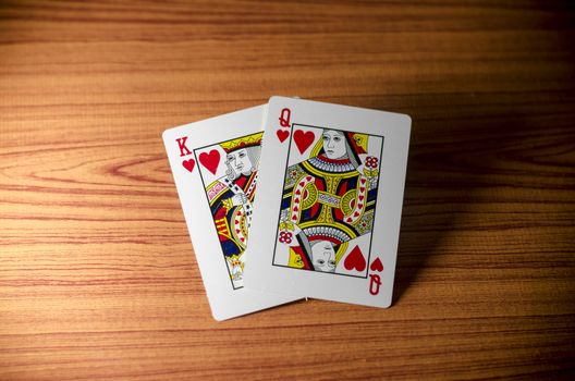 love king qeen card on wood background