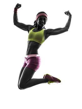 one caucasian woman jumping arms raised in silhouette on white background