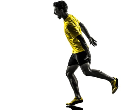 one caucasian man young sprinter runner running muscle strain cramp in silhouette studio on white background