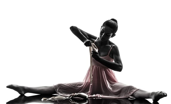 one woman  ballerina ballet dancer dancing in silhouette on white background