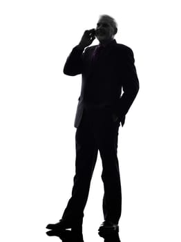 One Caucasian Senior Business Man on the telephone smiling Silhouette White Background