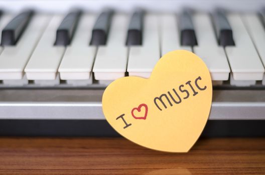 heart on key piano say love music