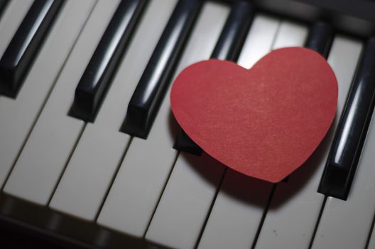 heart on key piano say love music