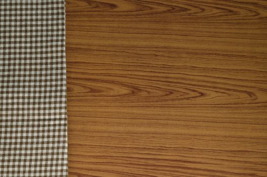brown kitchen towel pattern on wood background