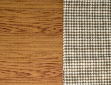 brown kitchen towel pattern on wood background