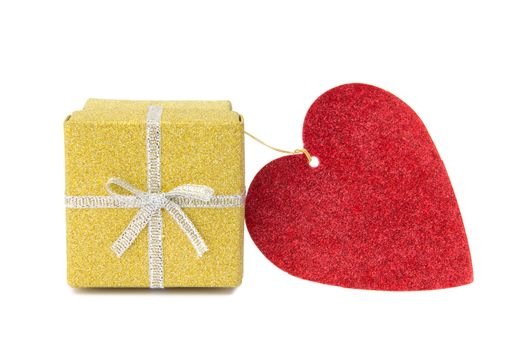 St Valentines golden shiny gift box and red heart shaped card on white background.