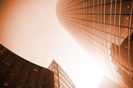 Sunset over skyscrapers in urban area of Paris