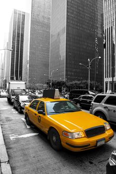 Yellow taxi in the black and white New York