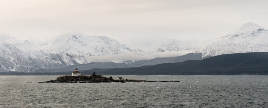 Snowcovered Mountains in  Alaska. Chilkat State Park. Mud Bay. HAINES. Alaska. USA