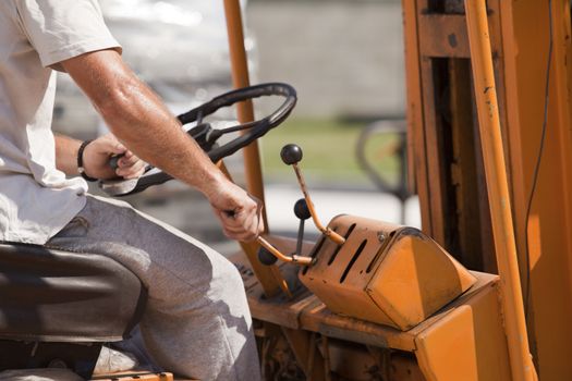 Man driving forklift