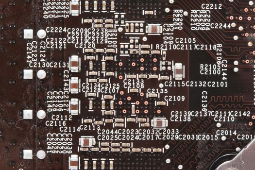 Close-up photo of electronic circuit board with integrated microchips