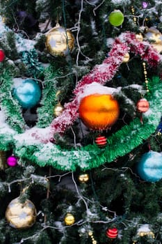 Decorative balls decoration on green Christmas tree