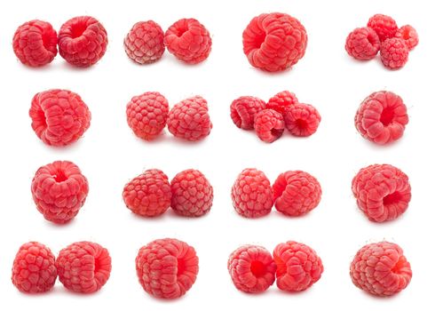 Collection of ripe red raspberries isolated on white background