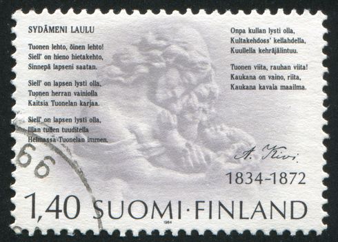 FINLAND - CIRCA 1984: stamp printed by Finland, shows Poet Aleksis Kivi, poem and relief, circa 1984
