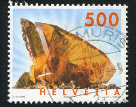 SWITZERLAND - CIRCA 2005: stamp printed by Switzerland, shows Titanite, Quartz crystal, circa 2005