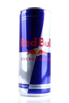 AYTOS, BULGARIA - JANUARY 23, 2014: Red Bull bottle can isolated on white background. Red Bull is an energy drink sold by Austrian company Red Bull GmbH, created in 1987.