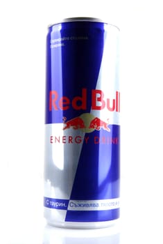 AYTOS, BULGARIA - JANUARY 23, 2014: Red Bull bottle can isolated on white background. Red Bull is an energy drink sold by Austrian company Red Bull GmbH, created in 1987.