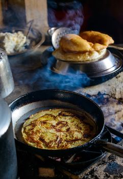 Preparing apple pancake and Gurung breads in nepal