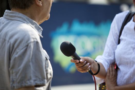 Interview with media microphone