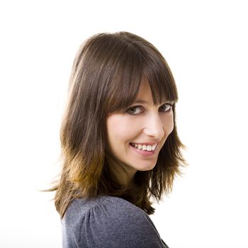 Portrait of a beautiful young woman looking at the camera and smiling, isolated on a white background