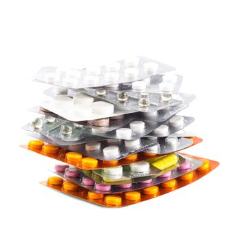 The variety of tablets in packs on white background