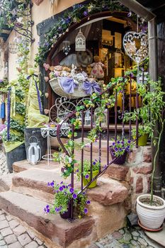 Beautiful decorated shop entrance with colorful flowers