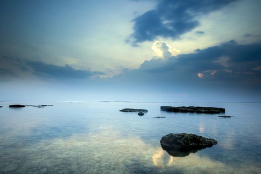 Beautiful landscape picture from a beach in Indonesia at sunset