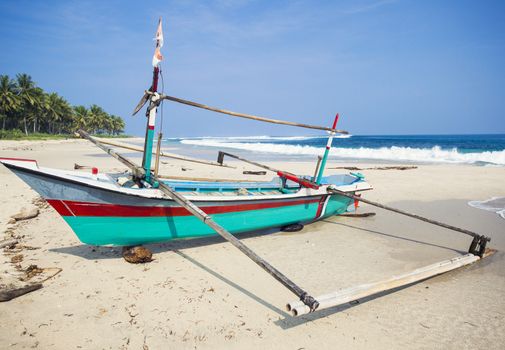 Beautiful landscape of a boat on a beach from Indon��sia