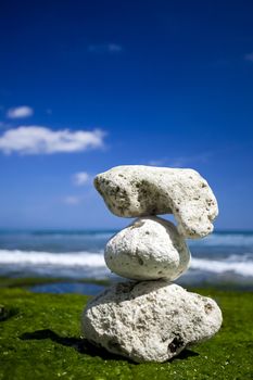 Beautiful tropical beach with white stones on the rocks