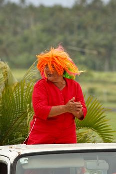 Woman celebrate arriving Fuifui Moimoi on Vavau island, Tonga