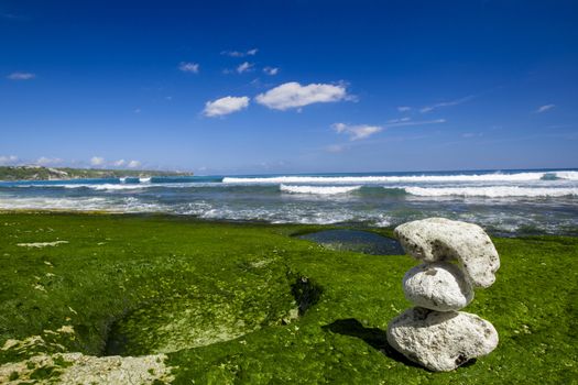 Beautiful tropical beach with white stones on the rocks