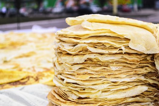 Stack of the pancakes on the blurred background