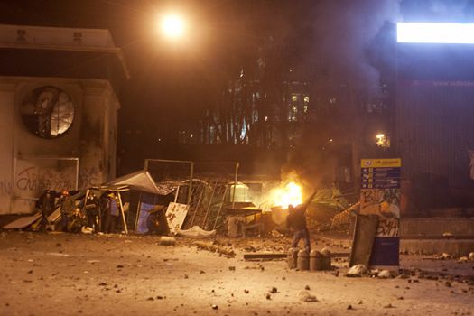 KYIV, UKRAINE - JANUARY 20, 2014: Unidentified people taking part in anti - goverment protests in Kiev, Ukraine.