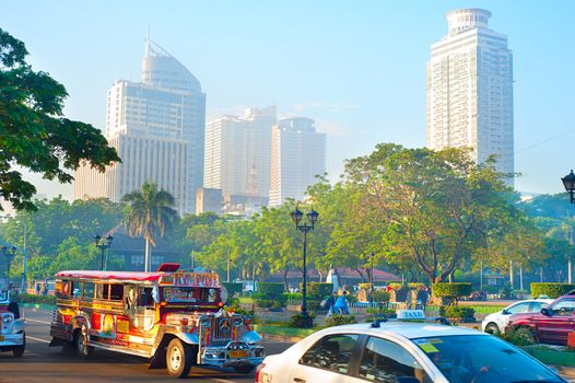 MANILA - APRIL 01, 2012: Morning traffic on the street in Manila, Philippines. Metro Manila is the most populous area in the Philippines with an estimated population of 16,300,000
