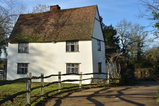 Rear of large white cottage