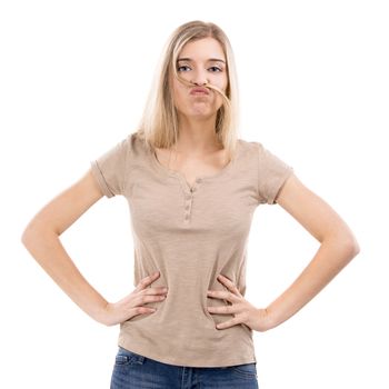 Blonde woman making a mustache with her own hair, isolated over white background