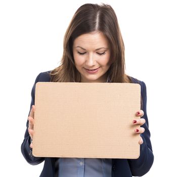 Business woman holding a cardboard, isolated over white background