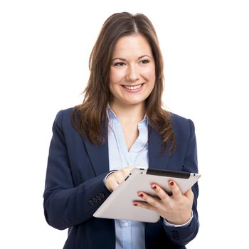 Business woman holding and working with a tablet, isolated over a white background