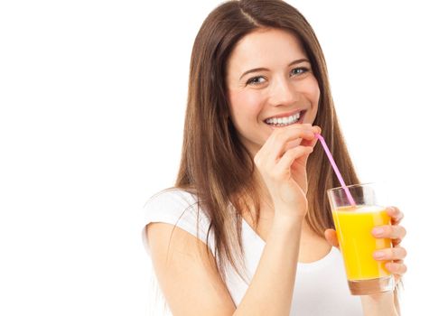 Portrait of a woman drinking an orange juice with a straw, isolated on white