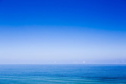 Beautiful landscape picture of a wonderful blue ocean and blue sky