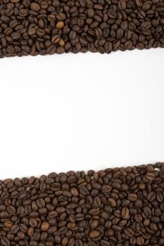 A lot of coffee beans on a white background