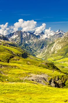 Landscape with a valley, mountain range and hiking trail