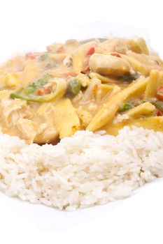 diced chicken in coconut curry sauce served with rice