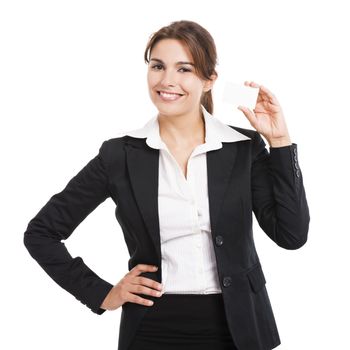 Successful businesswoman holding  a business card, isolated over a white background